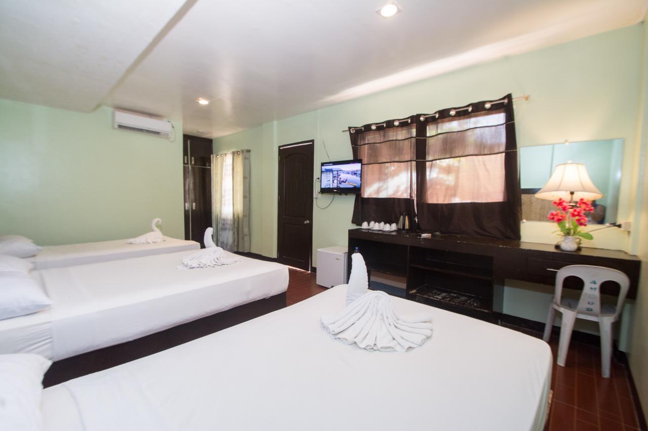 Bamboo Beach Resort & Restaurant Manoc-Manoc Bagian luar foto